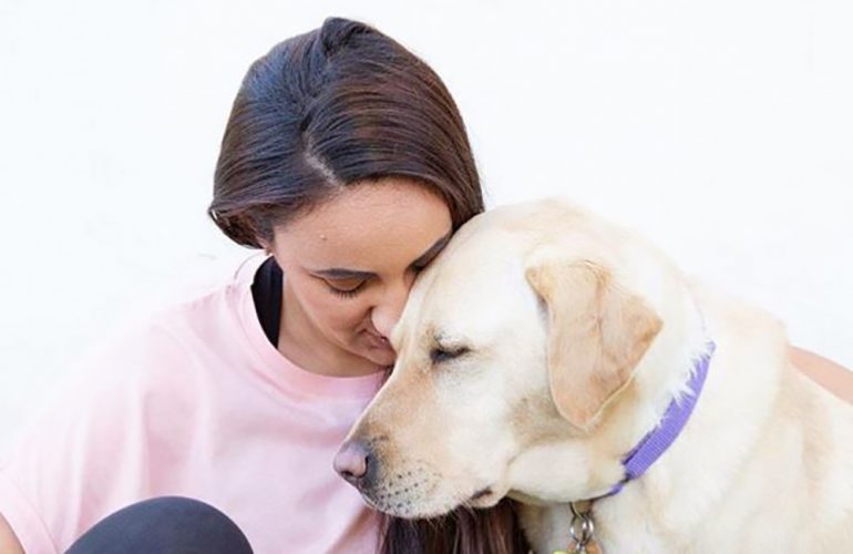 Chrissy and Guide Dog Lacey participate in PAWGUST